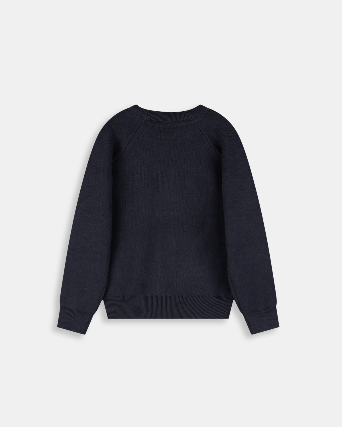 Jersey infantil azul pizarra de Harper & Neyer, bodegón trasero con manga raglan y punto liso