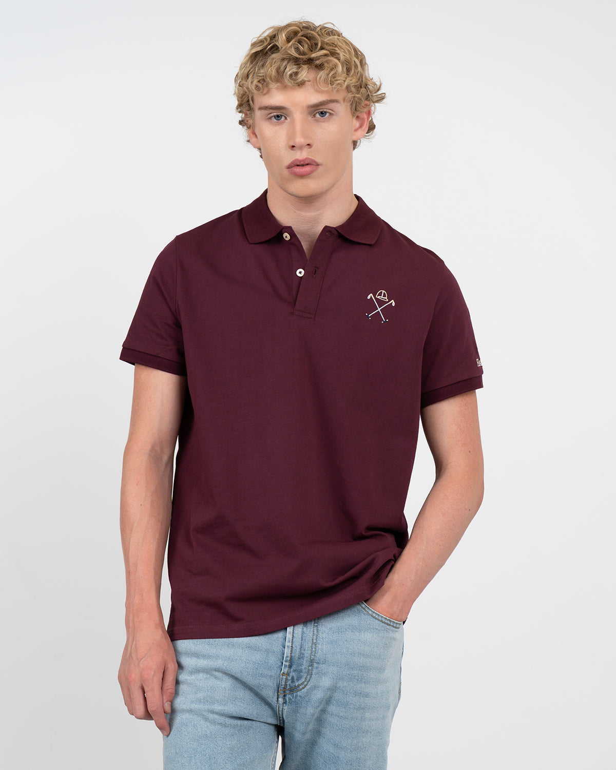 Polo WINNER de Harper & Neyer en algodón burdeos, vista frontal con bordado de casco y mazos de polo