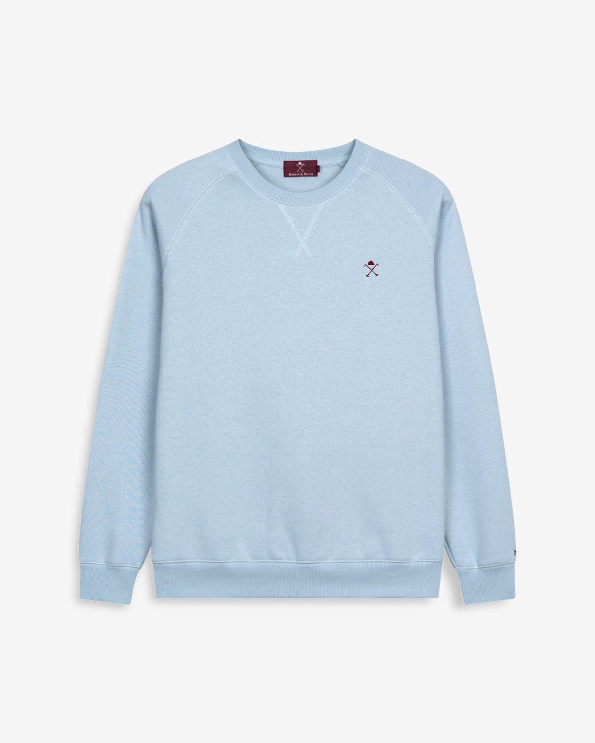 Sudadera VICTORY de Harper & Neyer en algodón azul cielo, bodegón frontal con bordado burdeos y manga ranglan