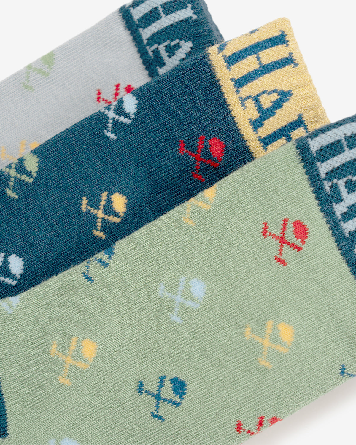 Calcetines MULTILOGO KIDS de Harper & Neyer, detalle del tejido de algodón con el estampado de logos
