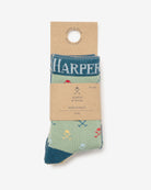 Calcetines MULTILOGO KIDS de Harper & Neyer, el pack apilado en verde, azul y mostaza