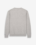 Jersey ICON en algodón gris jaspeado de Harper & Neyer, bodegón trasero con firma Neyer en la manga