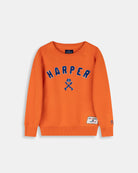 Jersey Retro Kids de Harper & Neyer en naranja vivo, bodegón frontal con lettering universitario
