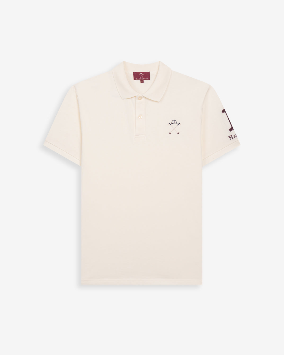 Polo WINNER de Harper & Neyer en algodón crudo, bodegón frontal con número uno bordado en la manga
