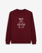 Sudadera FLUFFY BEAR de Harper & Neyer en burdeos, vista frontal con oso ilustrado bordado en hilo crudo