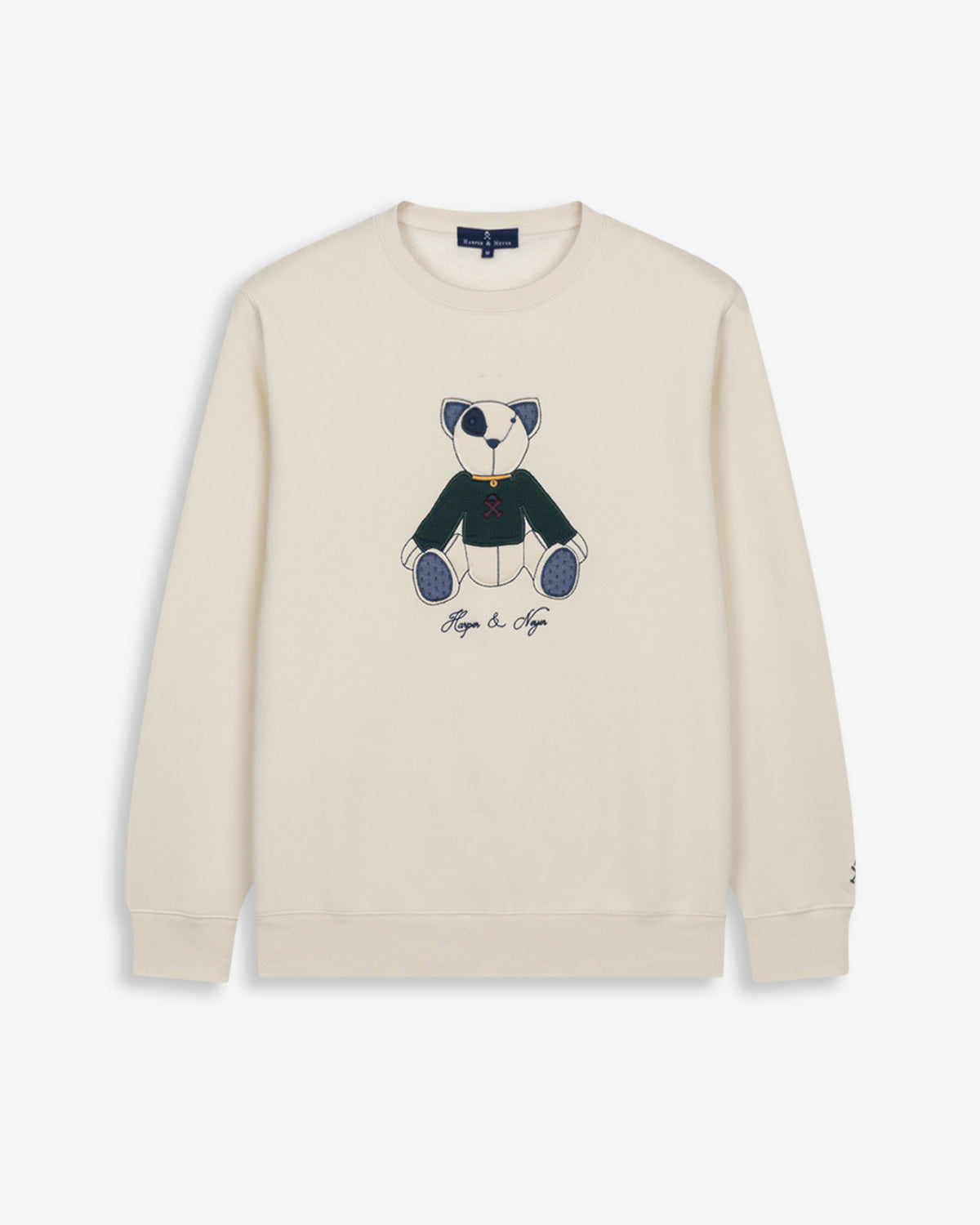 Sudadera TEDDY de Harper & Neyer en crudo, vista frontal con appliqué del oso con jersey verde botella